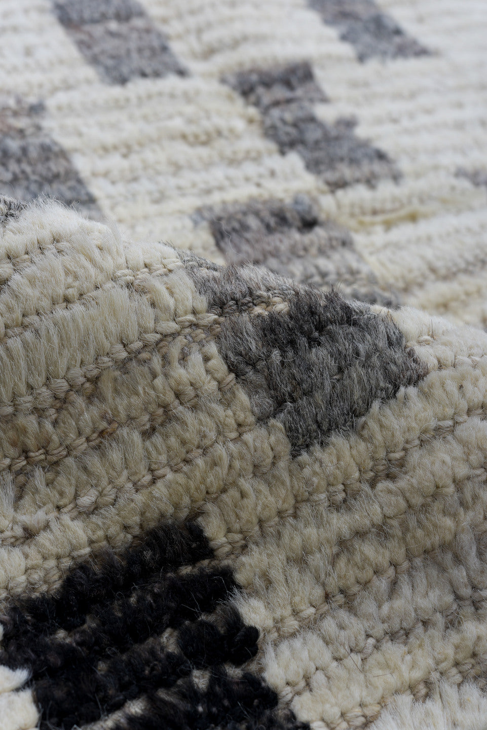 8' x 12' one-of-a-kind handmade vintage Tulu large size rug. Color palette: ivory, charcoal, gray, cream, black