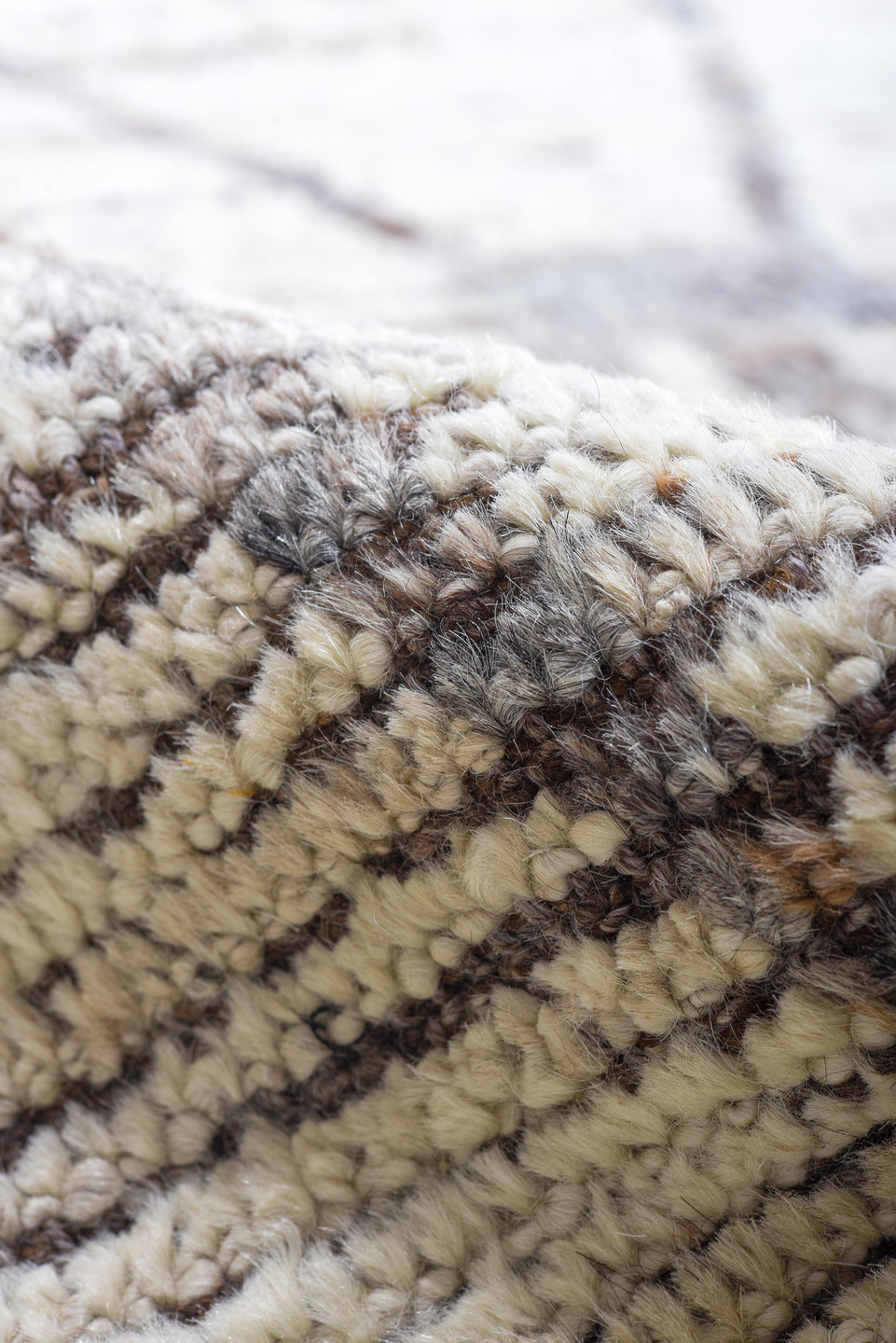 10' x 13' one-of-a-kind handmade vintage Tulu large size rug. Color palette: ivory, charcoal, taupe, brown, gray, black