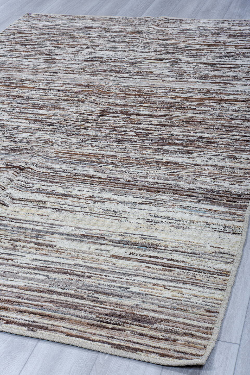 6' x 9' one-of-a-kind handmade vintage Tulu medium size rug. Color palette: ivory, taupe, brown, charcoal, cream, beige