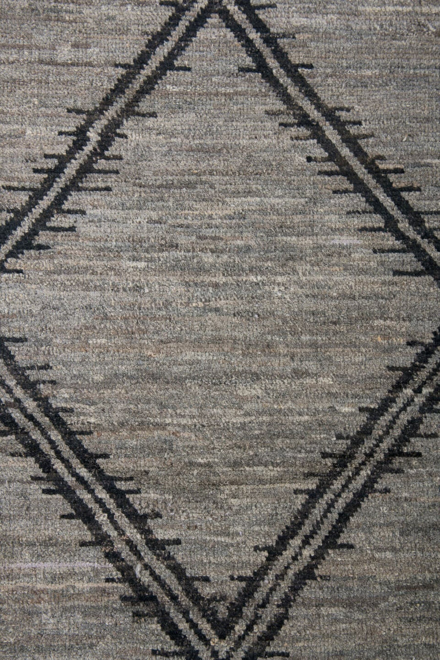 9' x 12' one-of-a-kind handmade vintage Tulu large size rug. Color palette: gray, charcoal, taupe, ivory, black, beige