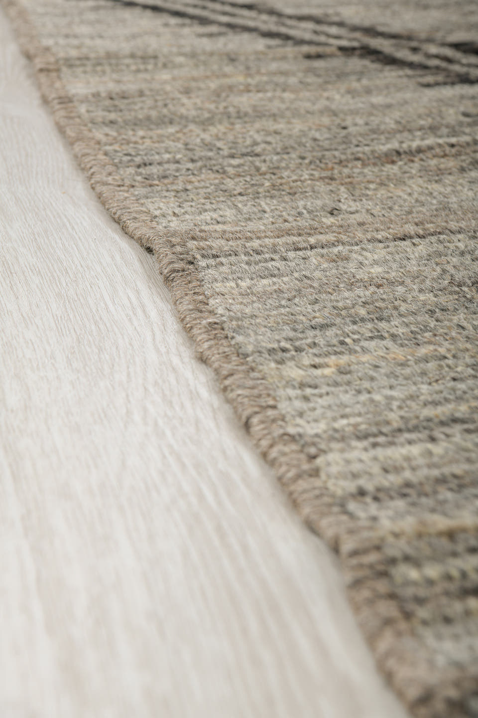 9' x 12' one-of-a-kind handmade vintage Tulu large size rug. Color palette: gray, charcoal, taupe, ivory, black, beige