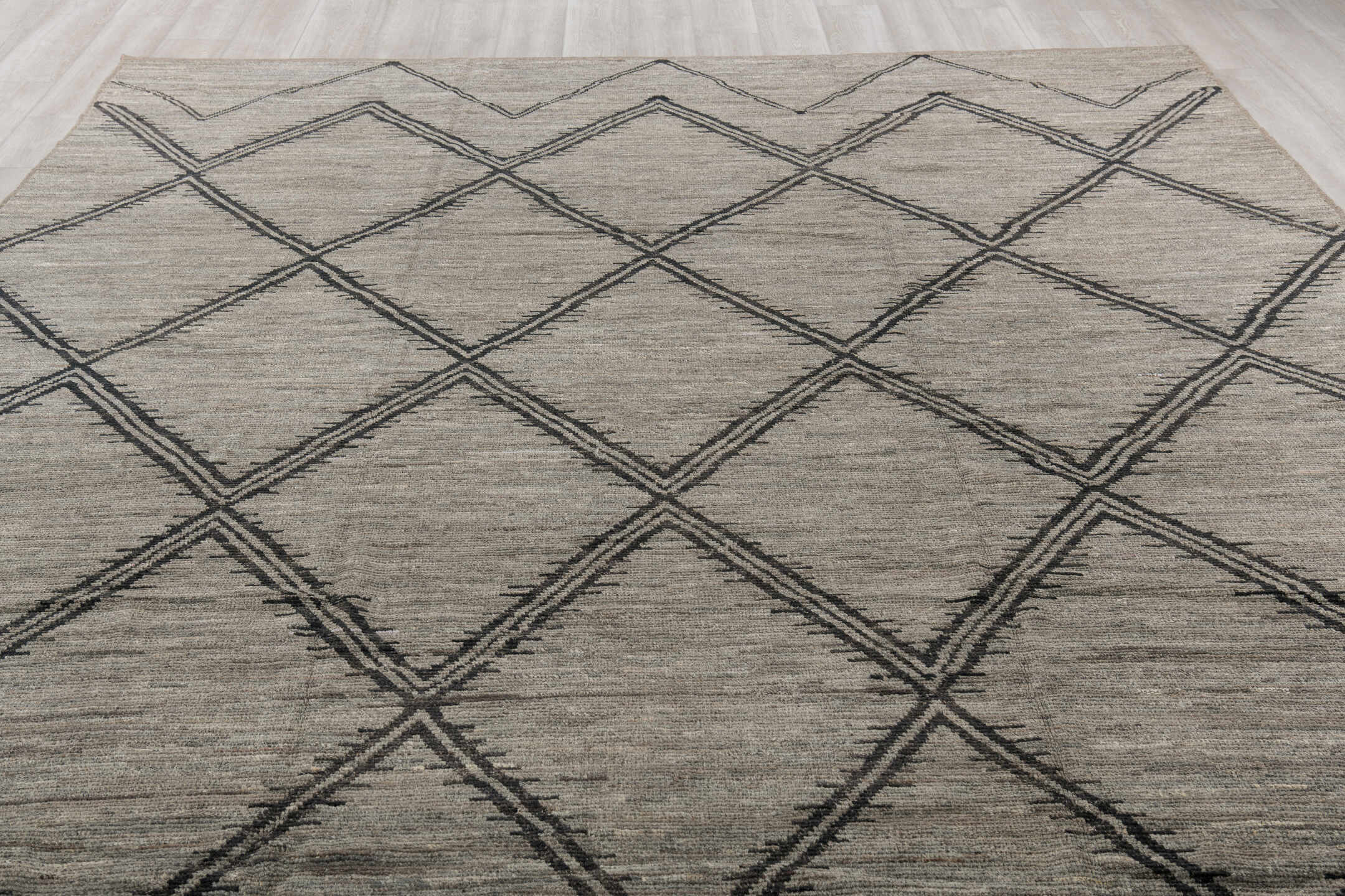 9' x 12' one-of-a-kind handmade vintage Tulu large size rug. Color palette: gray, charcoal, taupe, ivory, black, beige