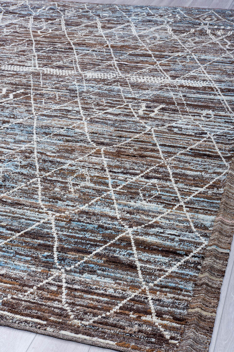 10' x 13' one-of-a-kind handmade vintage Tulu large size rug. Color palette: brown, ivory, pale blue, taupe, charcoal