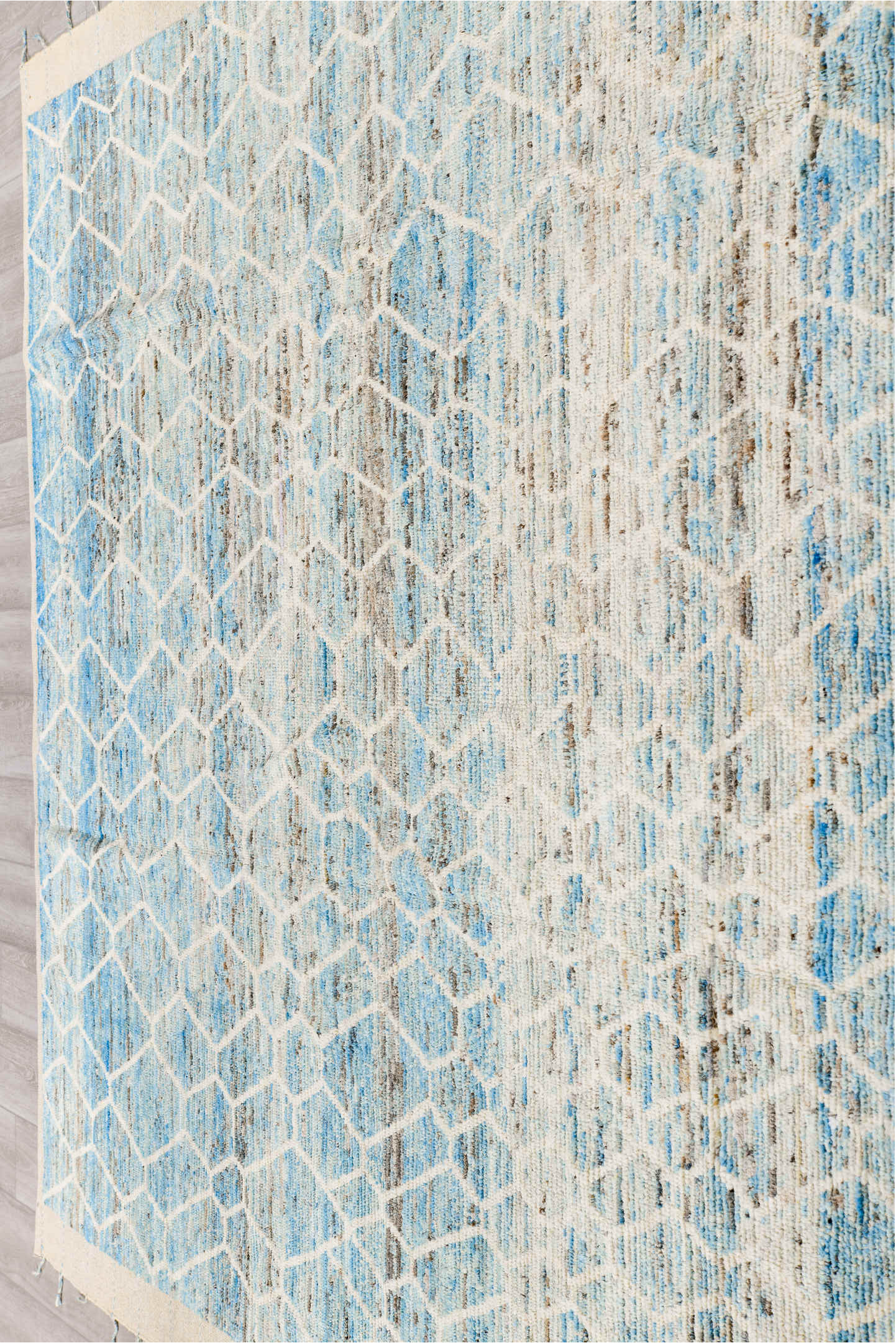 8' x 10' one-of-a-kind handmade vintage Tulu large size rug. Color palette: ivory, pale blue, light blue, silver gray, taupe