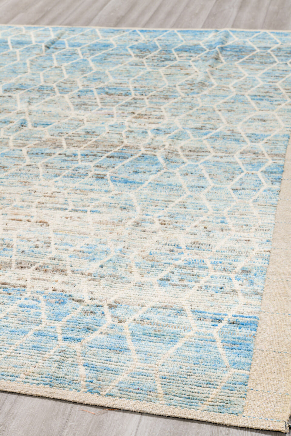 8' x 10' one-of-a-kind handmade vintage Tulu large size rug. Color palette: ivory, pale blue, light blue, silver gray, taupe
