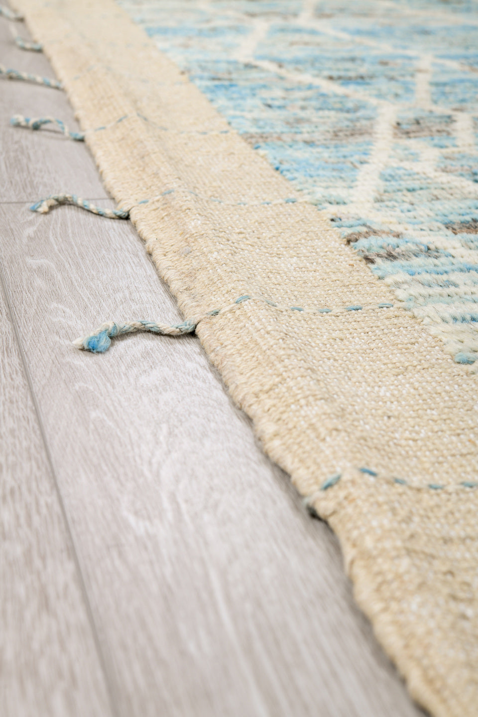 8' x 10' one-of-a-kind handmade vintage Tulu large size rug. Color palette: ivory, pale blue, light blue, silver gray, taupe