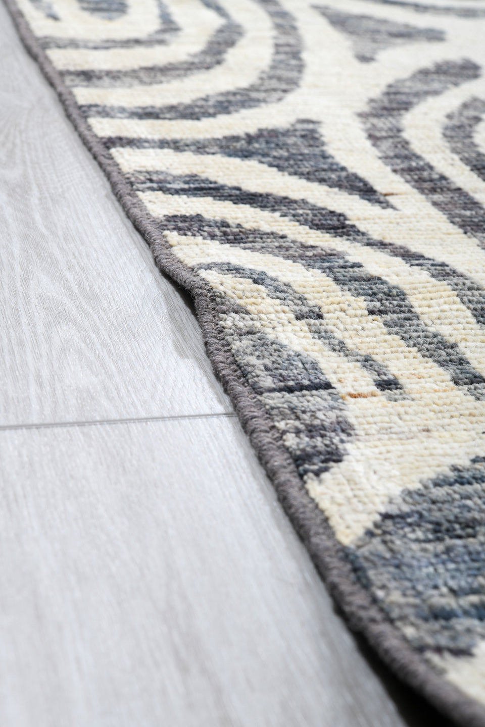 13' x 19' one-of-a-kind handmade vintage Tulu oversize rug. Color palette: ivory, slate, charcoal, gray, black
