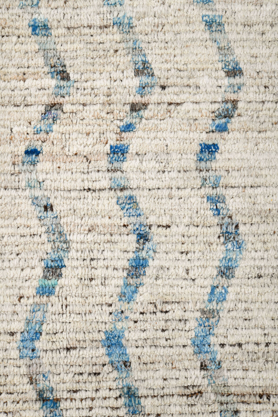 12' x 12' one-of-a-kind handmade vintage Tulu oversize rug. Color palette: ivory, pale blue, taupe, brown, light blue, beige