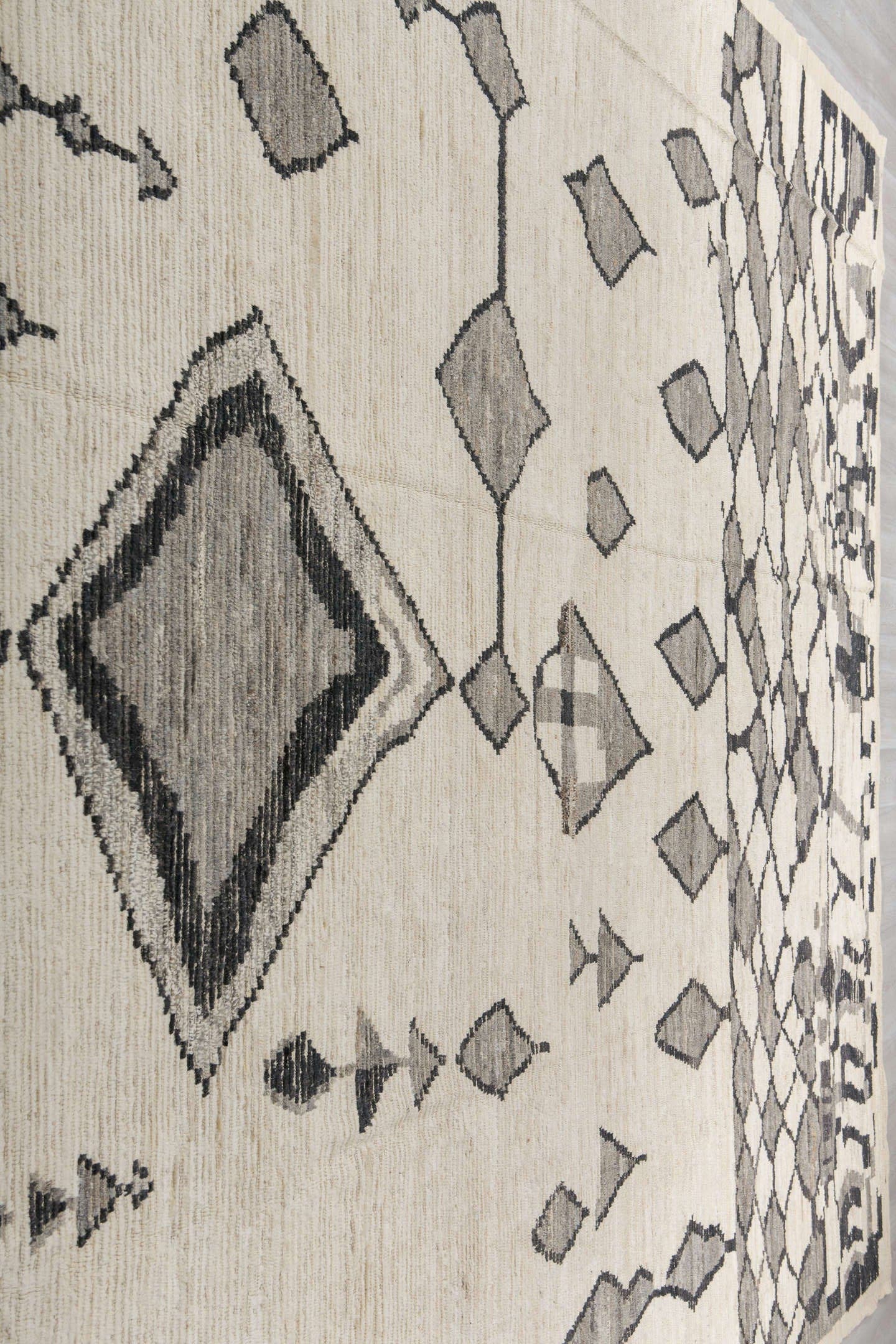 11' x 16' one-of-a-kind handmade vintage Tulu oversize rug. Color palette: ivory, charcoal, gray, cream, taupe, black, beige