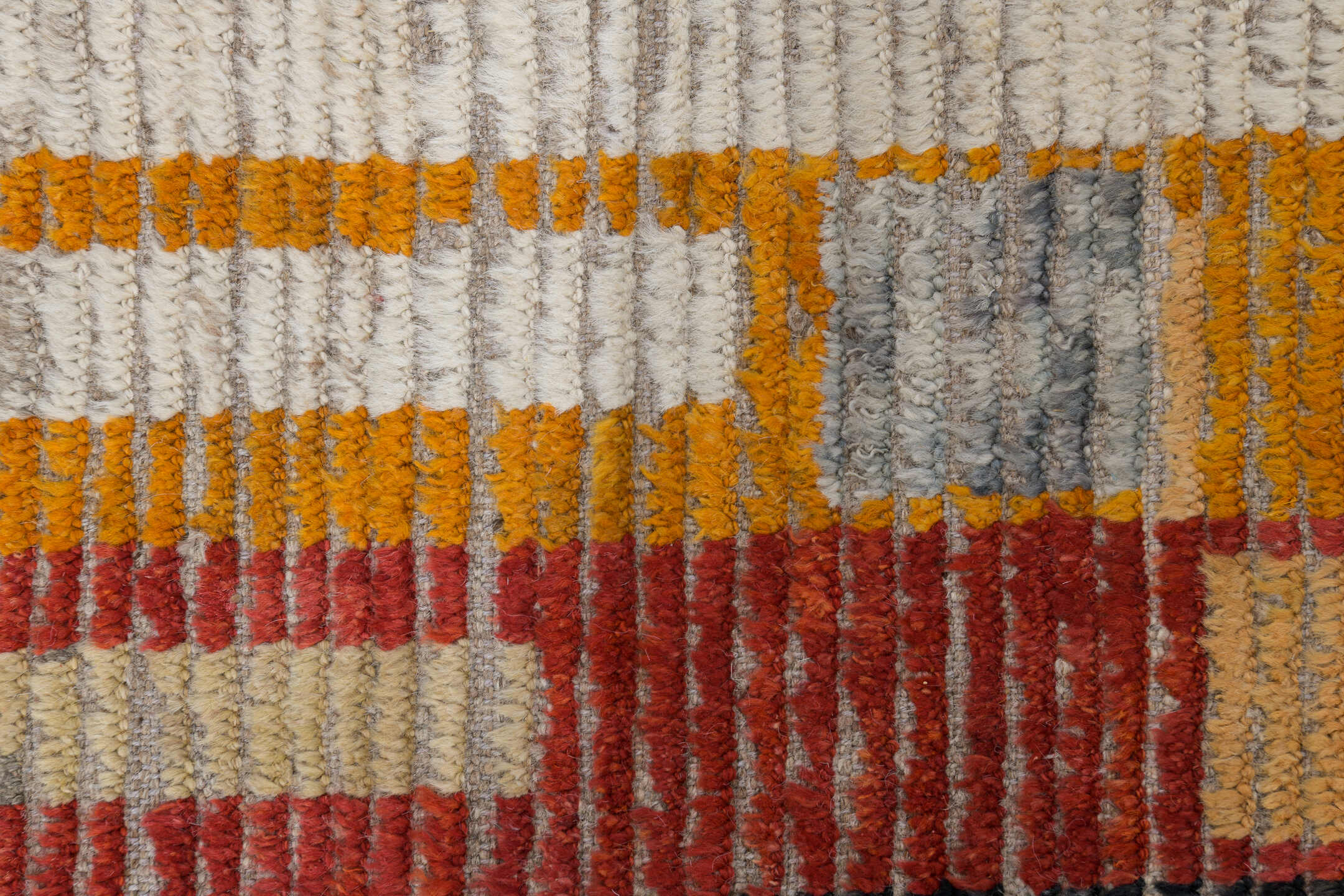 10' x 13' one-of-a-kind handmade vintage Tulu oversize rug. Color palette: ivory, rust, saffron, charcoal, pale blue, sage