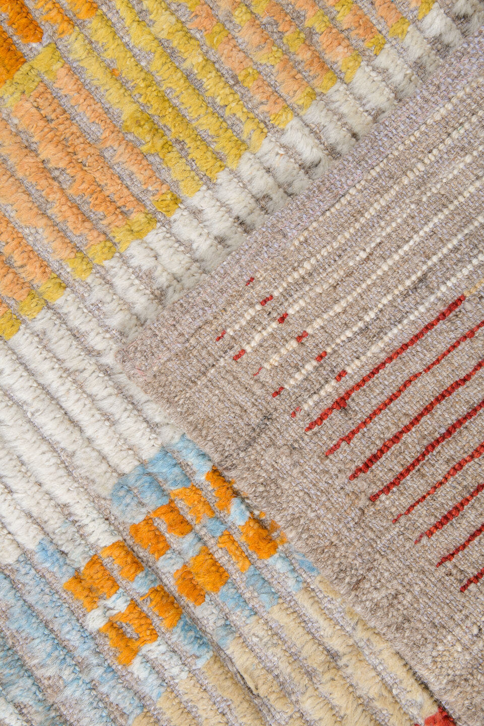 10' x 13' one-of-a-kind handmade vintage Tulu oversize rug. Color palette: ivory, rust, saffron, charcoal, pale blue, sage