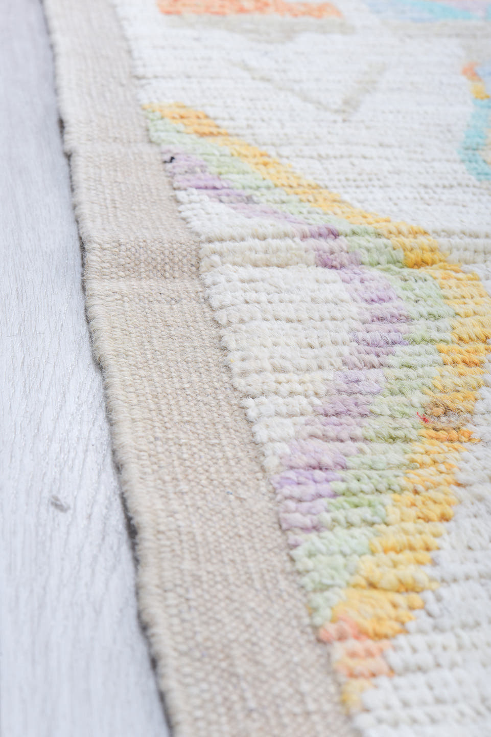 12' x 15' one-of-a-kind handmade vintage Tulu oversize rug. Color palette: ivory, aqua, lavender, apricot, pale blue, sage