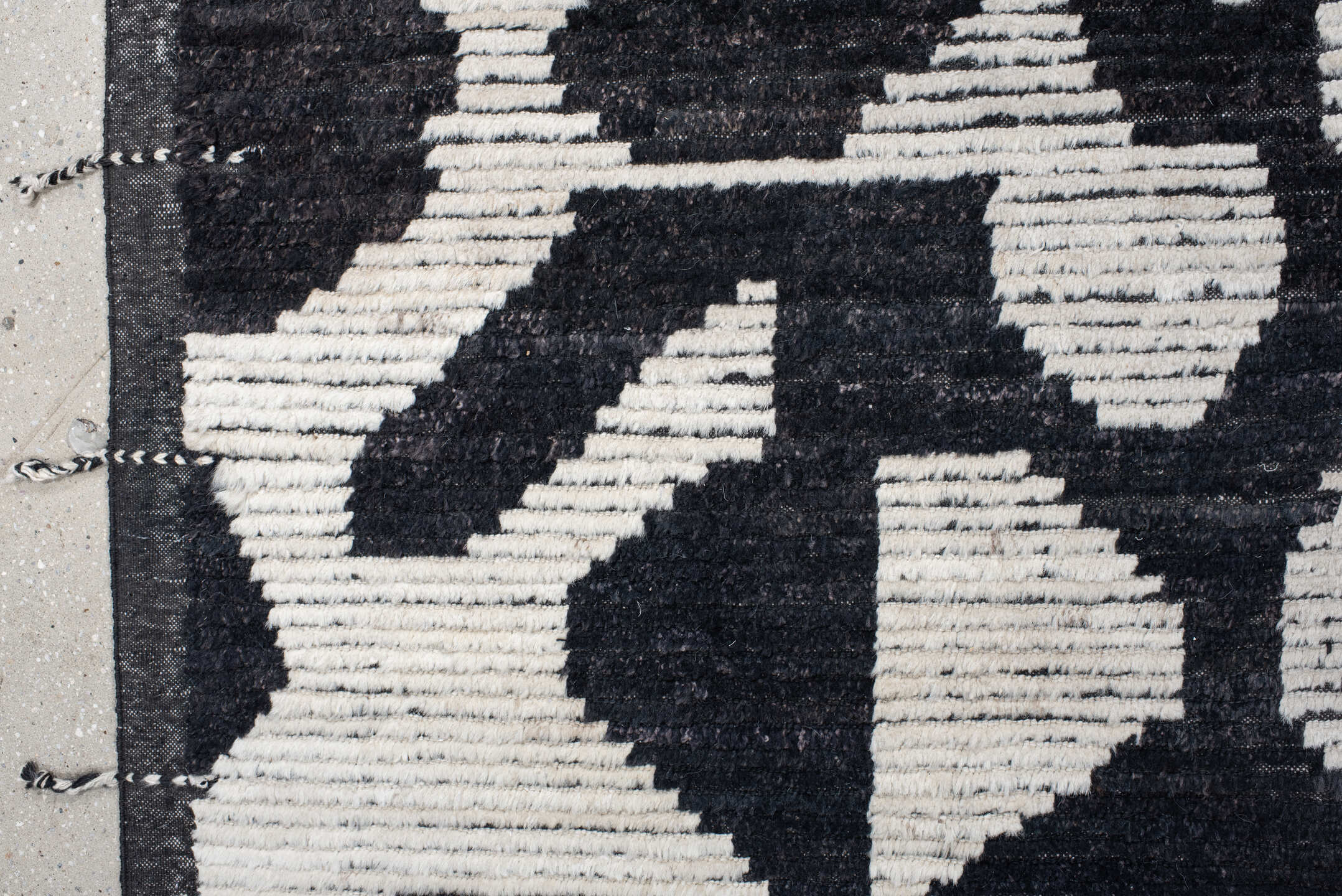 9' x 12' one-of-a-kind handmade vintage Tulu large size rug. Color palette: charcoal, ivory, gray, black