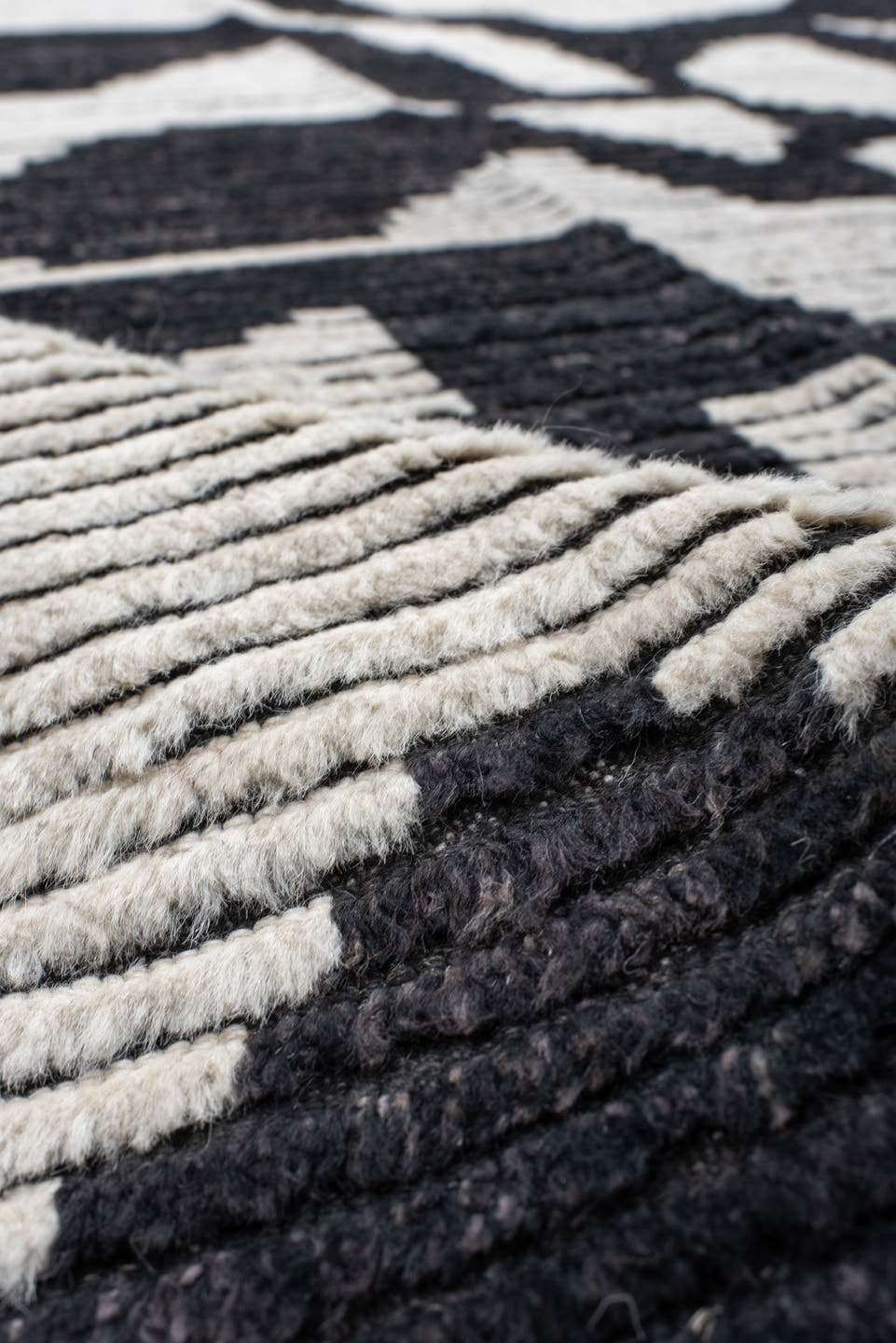 9' x 12' one-of-a-kind handmade vintage Tulu large size rug. Color palette: charcoal, ivory, gray, black