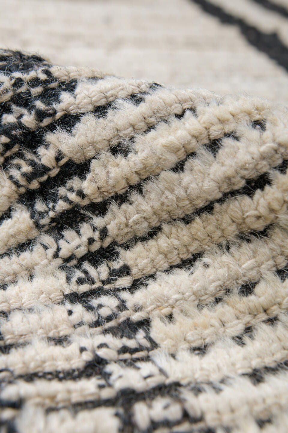 10' x 13' one-of-a-kind handmade vintage Tulu large size rug. Color palette: ivory, charcoal, gray, black