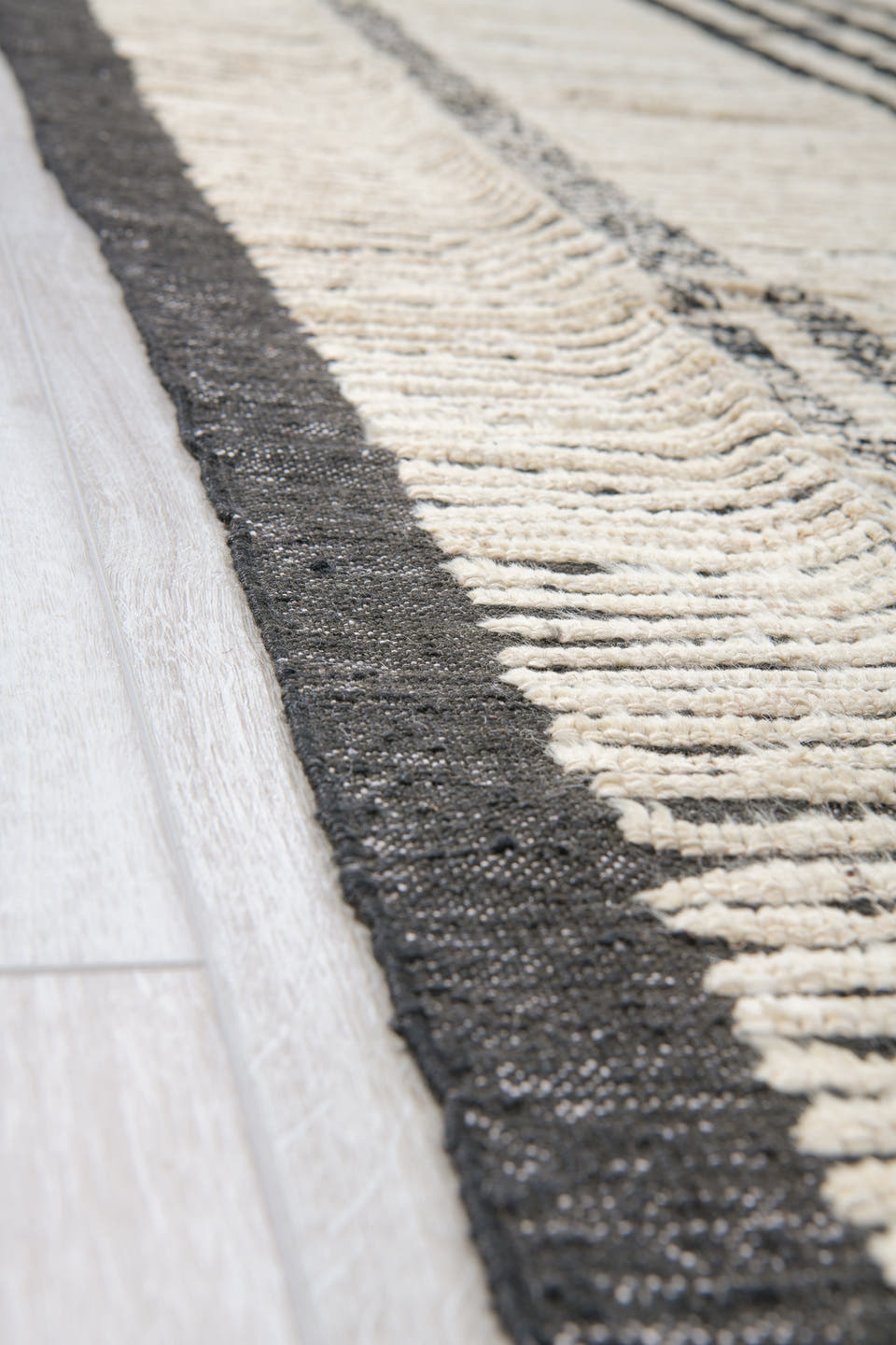 10' x 13' one-of-a-kind handmade vintage Tulu large size rug. Color palette: ivory, charcoal, gray, black