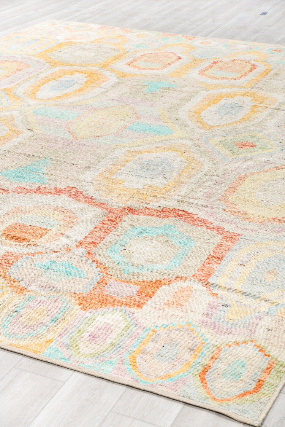 10' x 13' one-of-a-kind handmade vintage Tulu large size rug. Color palette: ivory, aqua, pale yellow, rust, lavender, taupe