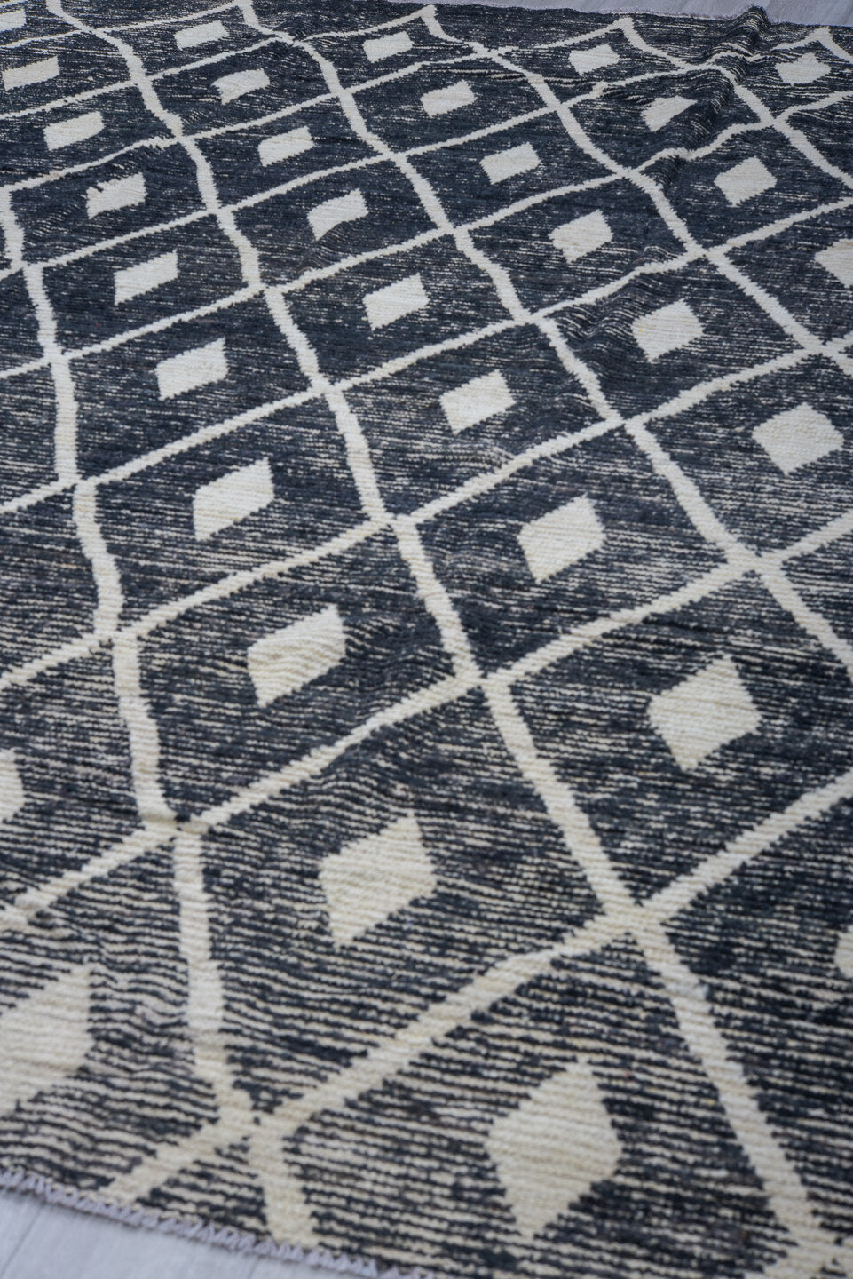 9' x 11' one-of-a-kind handmade vintage Tulu large size rug. Color palette: charcoal, ivory, gray, black