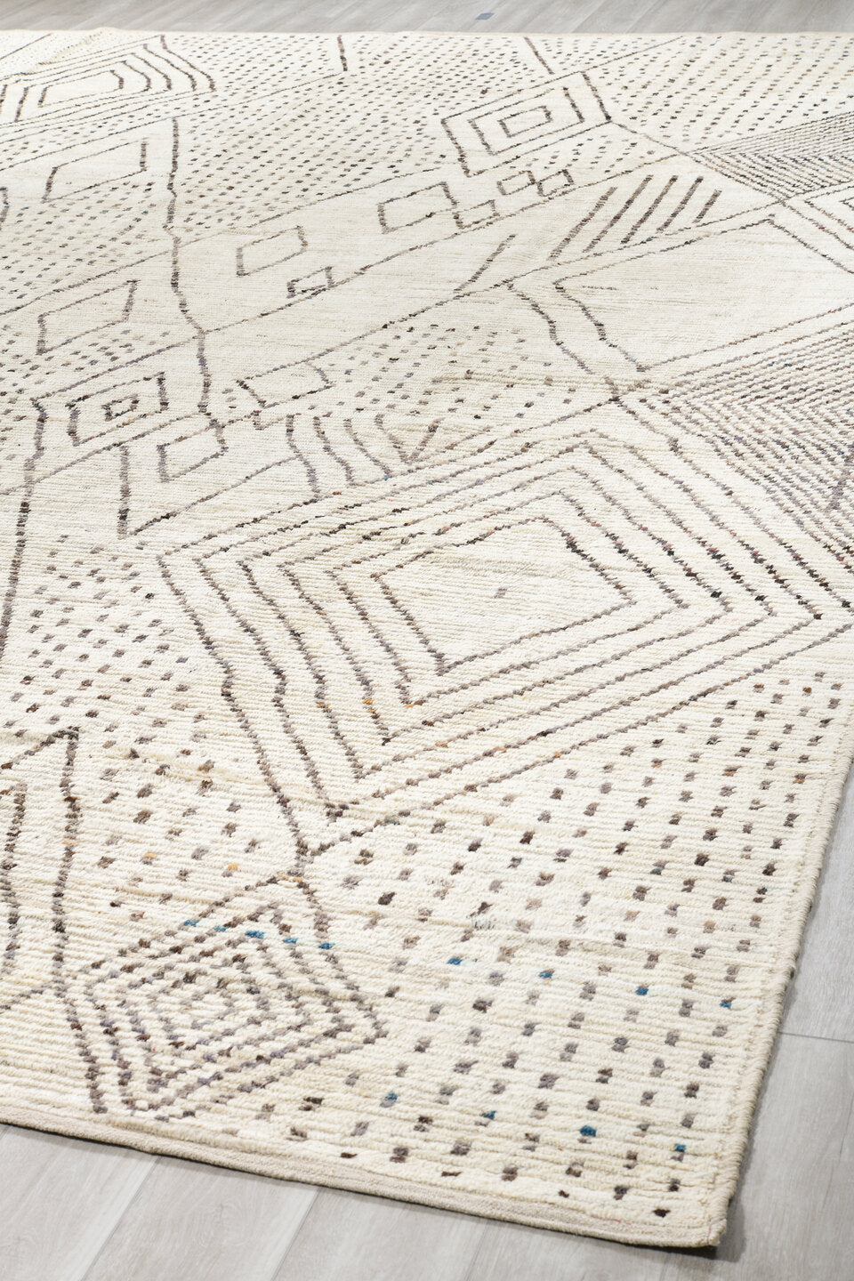 11' x 17' one-of-a-kind handmade vintage Tulu oversize rug. Color palette: ivory, charcoal, taupe, cream, gray, black, beige