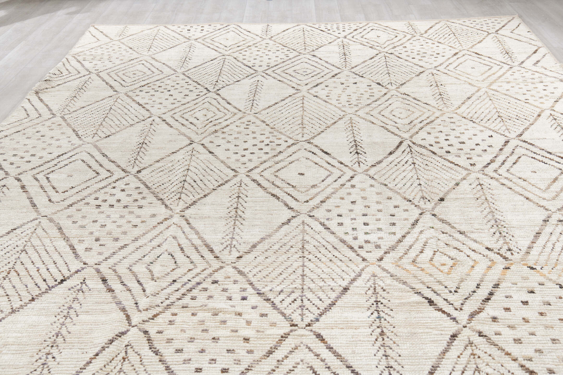 10' x 14' one-of-a-kind handmade vintage Tulu large size rug. Color palette: ivory, taupe, charcoal, cream, beige, gray