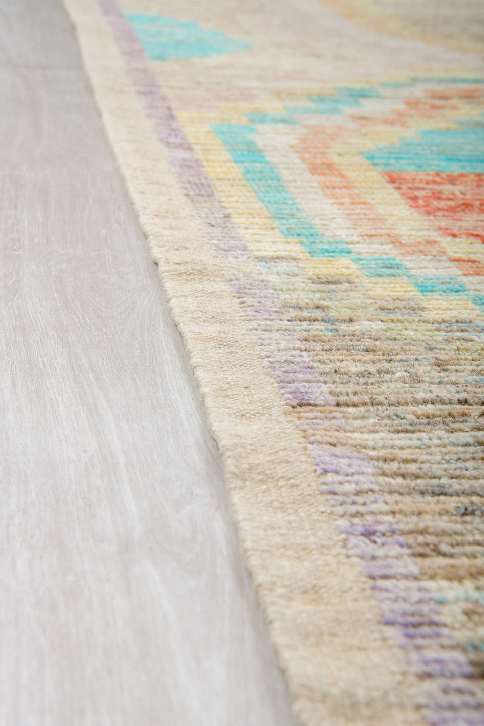 13' x 16' one-of-a-kind handmade vintage Tulu oversize rug. Color palette: ivory, aqua, apricot, lavender, taupe, coral