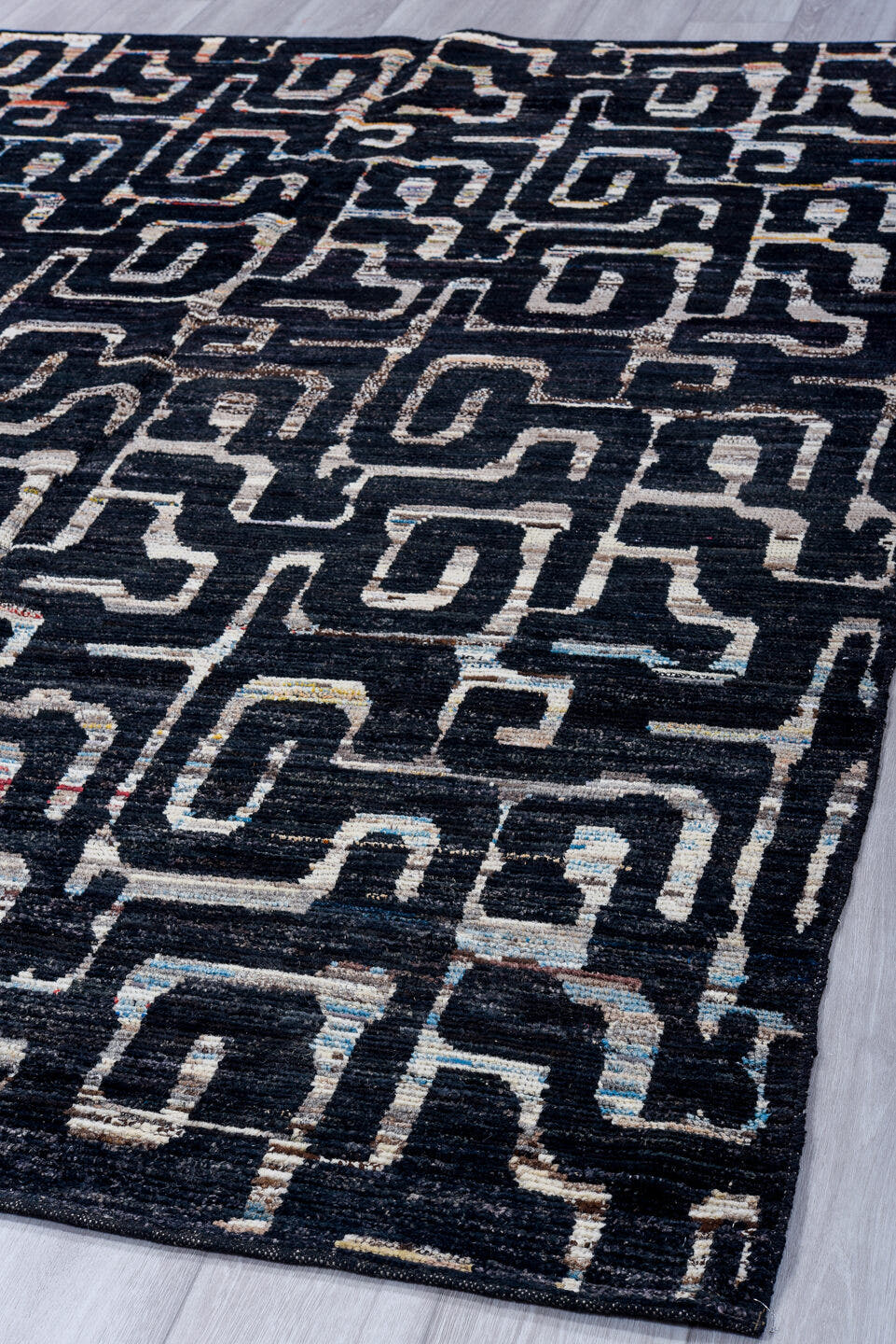 6' x 8' one-of-a-kind handmade vintage Tulu medium size rug. Color palette: charcoal, ivory, slate, taupe, rust, navy, gray