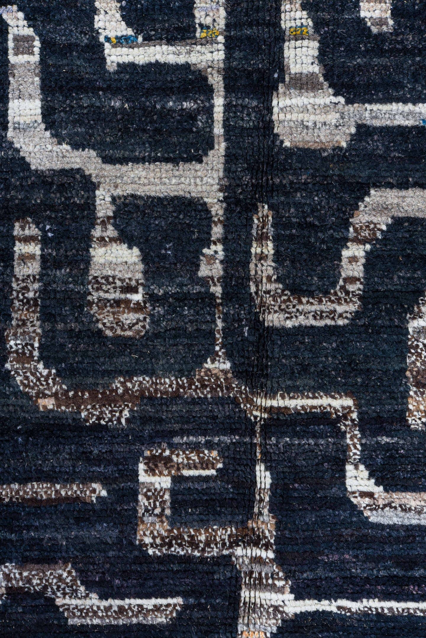 6' x 8' one-of-a-kind handmade vintage Tulu medium size rug. Color palette: charcoal, ivory, slate, taupe, rust, navy, gray
