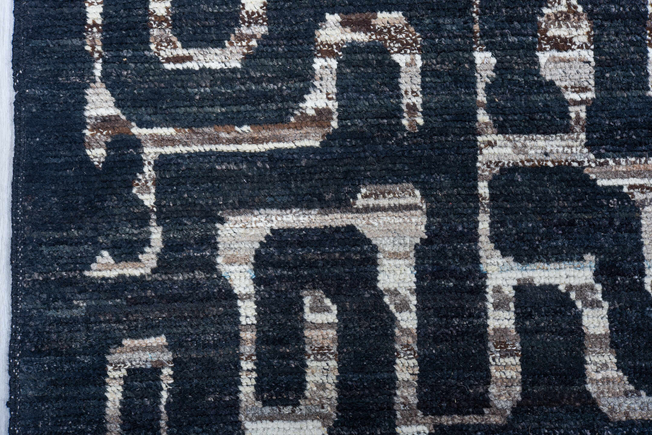 6' x 8' one-of-a-kind handmade vintage Tulu medium size rug. Color palette: charcoal, ivory, slate, taupe, rust, navy, gray