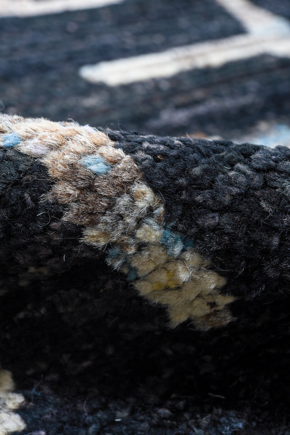 6' x 8' one-of-a-kind handmade vintage Tulu medium size rug. Color palette: black, blue, brown, charcoal, dark gray