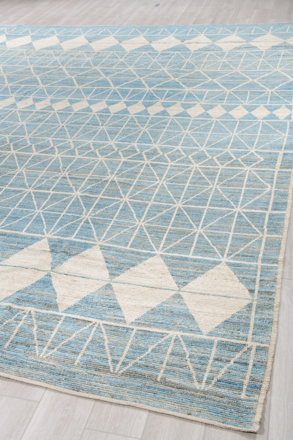 11' x 14' one-of-a-kind handmade vintage Tulu oversize rug. Color palette: sky blue, ivory, cream, pale blue, light blue
