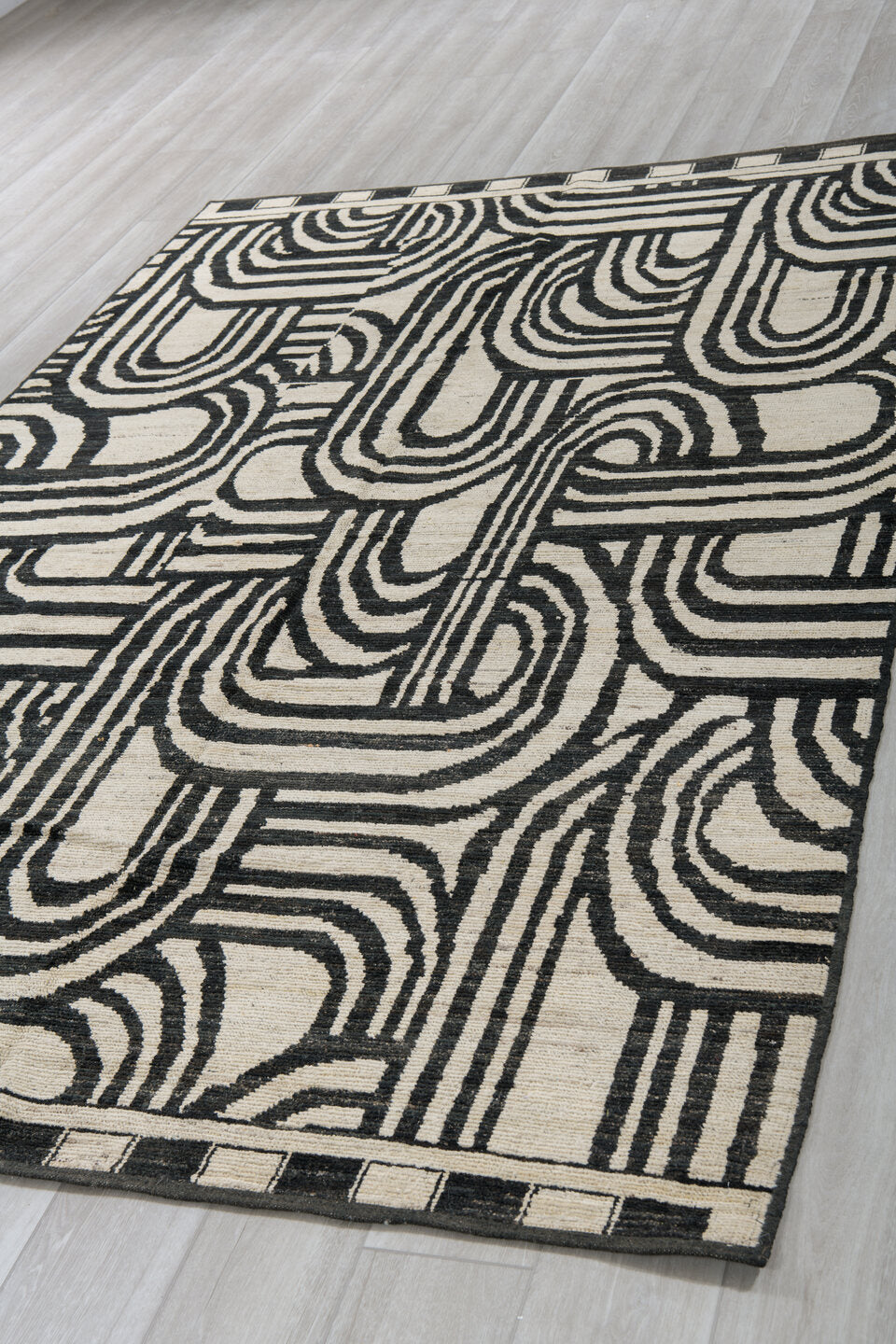 6' x 9' one-of-a-kind handmade vintage Tulu medium size rug. Color palette: ivory, charcoal, gray, black