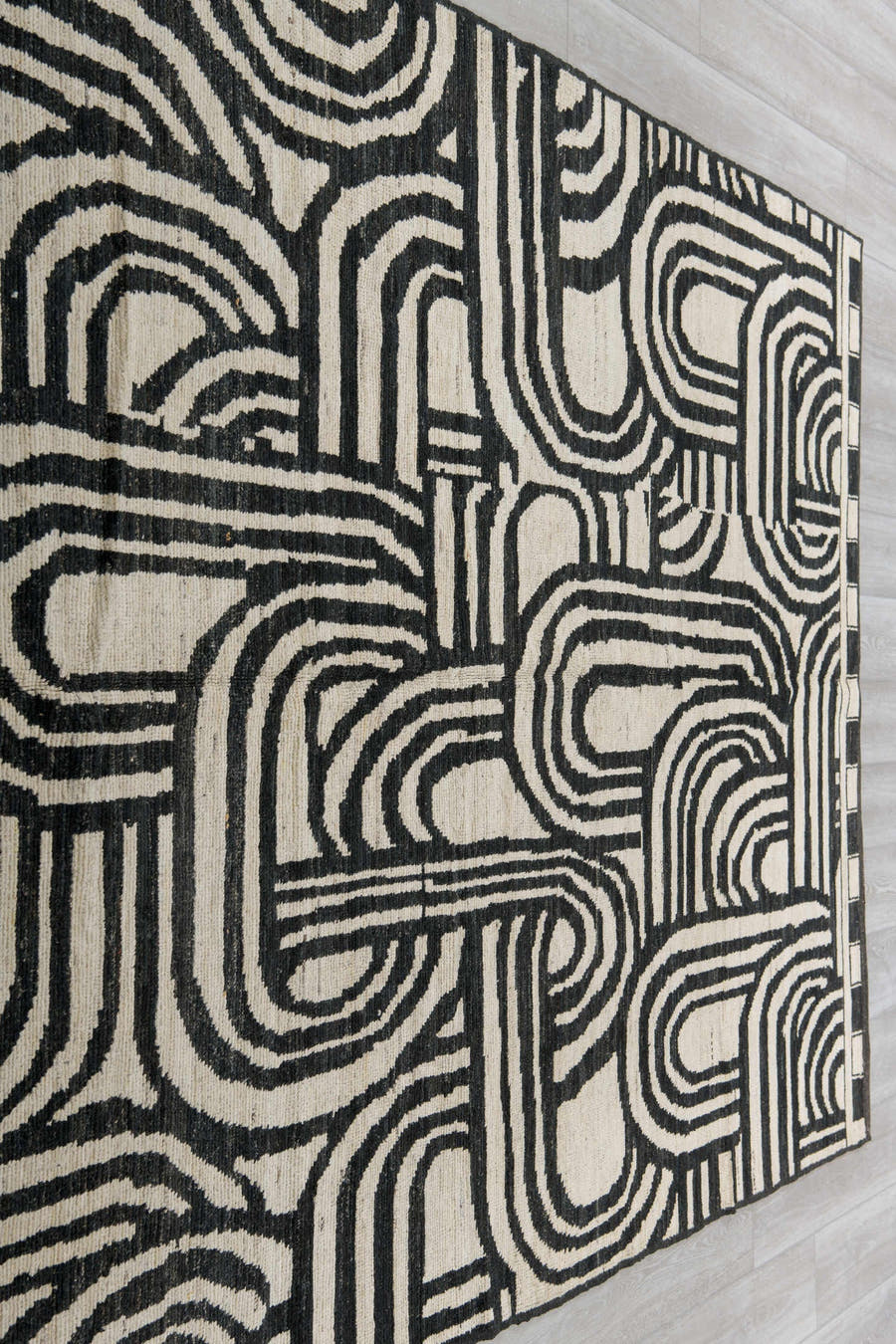 6' x 9' one-of-a-kind handmade vintage Tulu medium size rug. Color palette: ivory, charcoal, gray, black