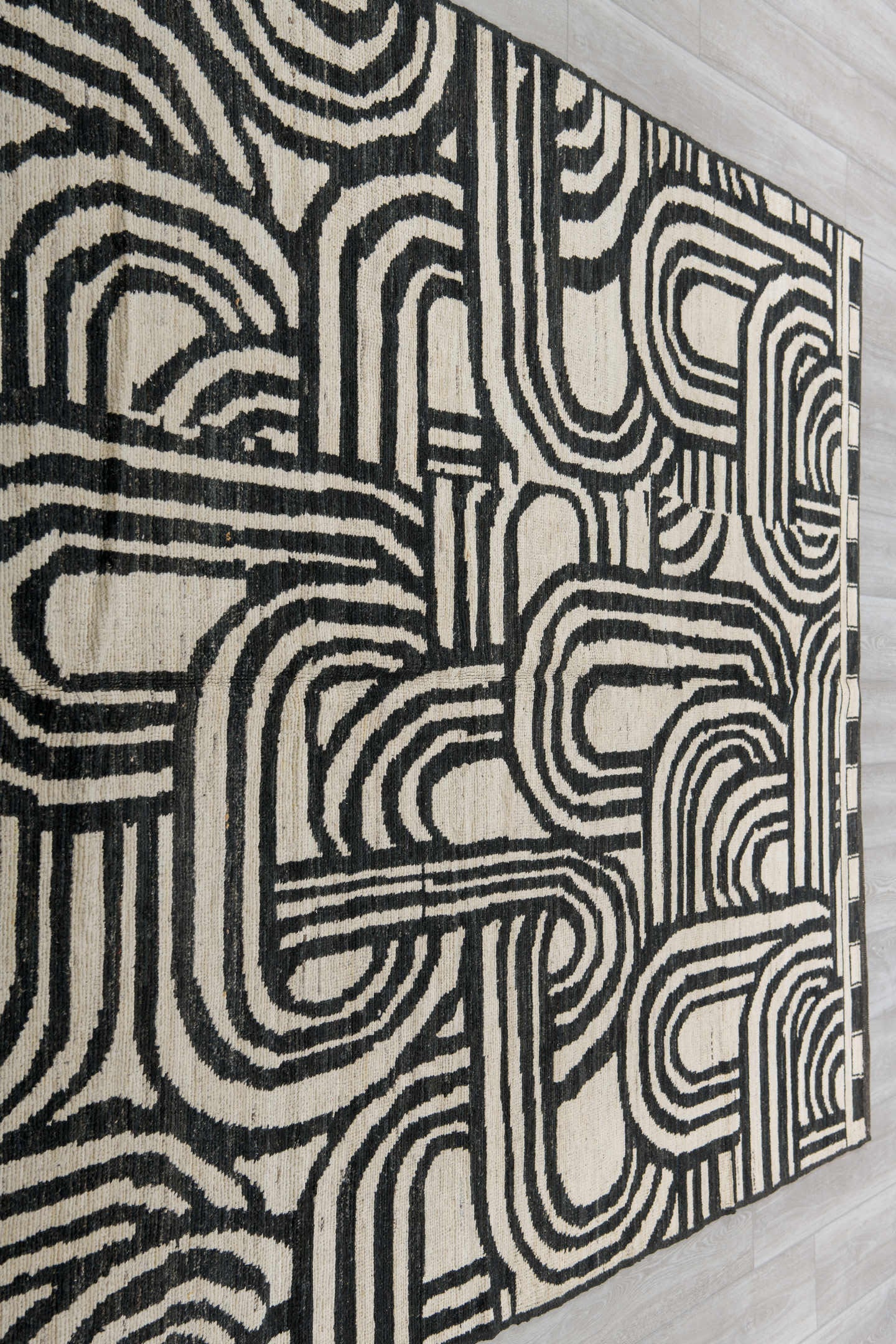 6' x 9' one-of-a-kind handmade vintage Tulu medium size rug. Color palette: ivory, charcoal, gray, black