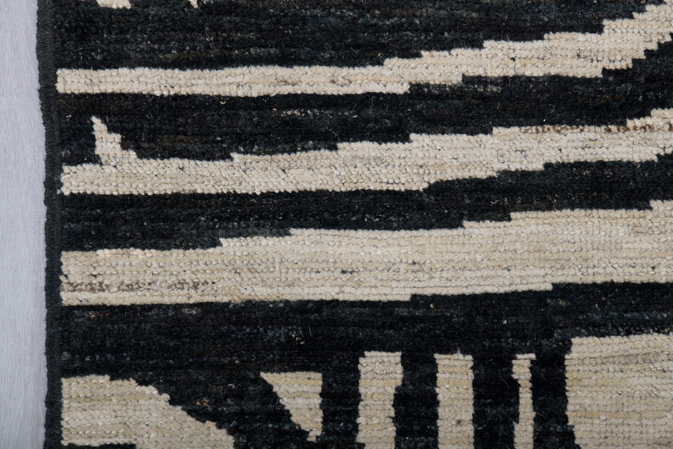 6' x 9' one-of-a-kind handmade vintage Tulu medium size rug. Color palette: ivory, charcoal, gray, black