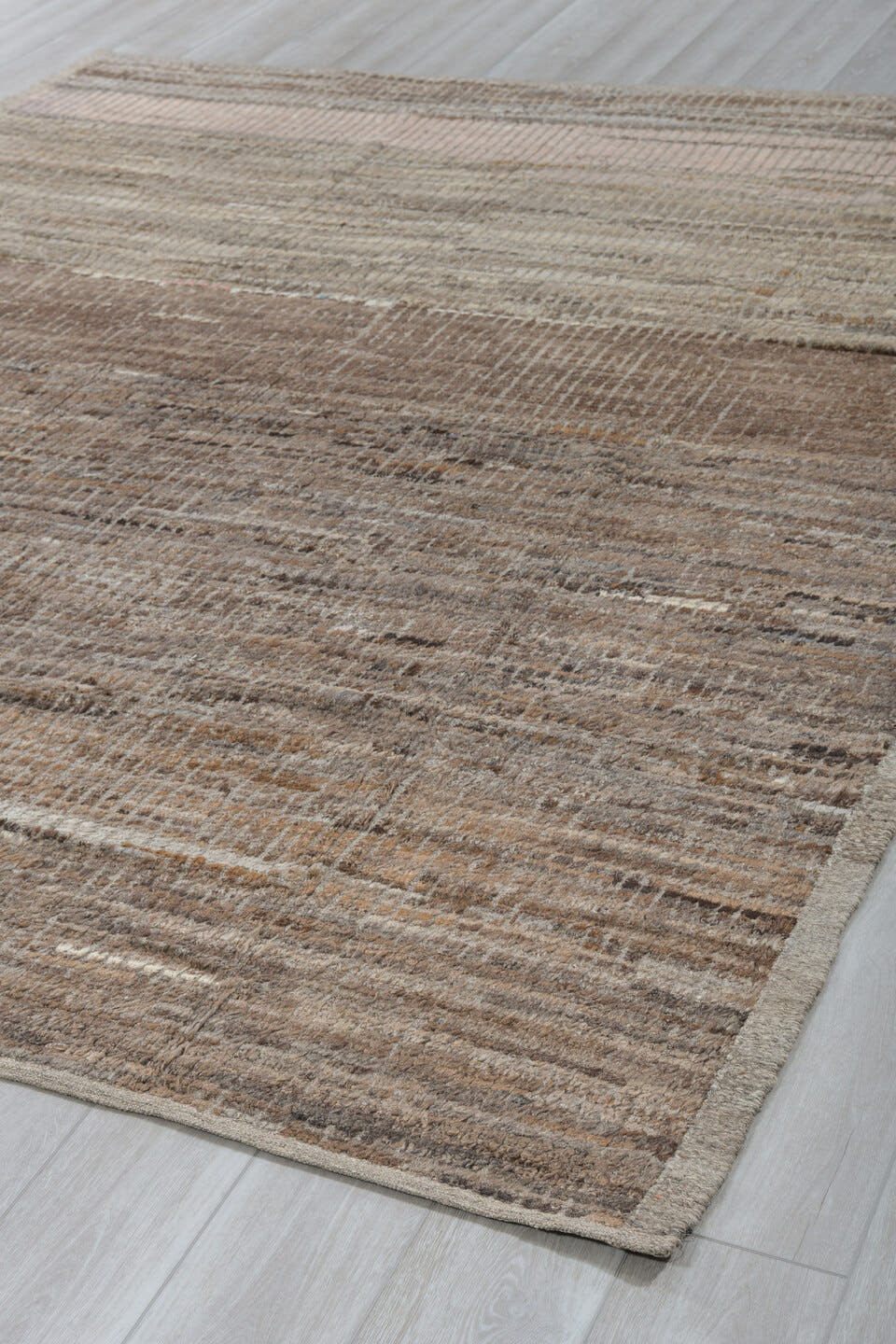 8' x 9' one-of-a-kind handmade vintage Tulu rug. Color palette: taupe, brown, ivory, gray, camel, charcoal, beige, black
