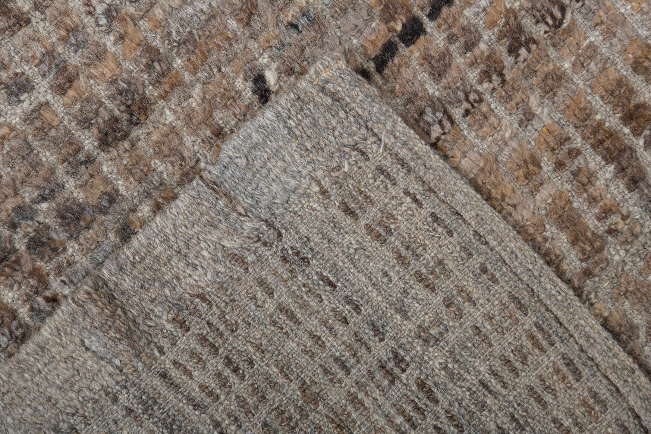 8' x 9' one-of-a-kind handmade vintage Tulu rug. Color palette: taupe, brown, ivory, gray, camel, charcoal, beige, black