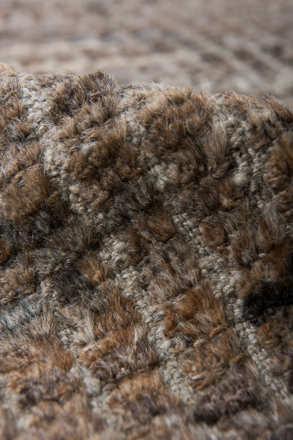 8' x 9' one-of-a-kind handmade vintage Tulu rug. Color palette: taupe, brown, ivory, gray, camel, charcoal, beige, black