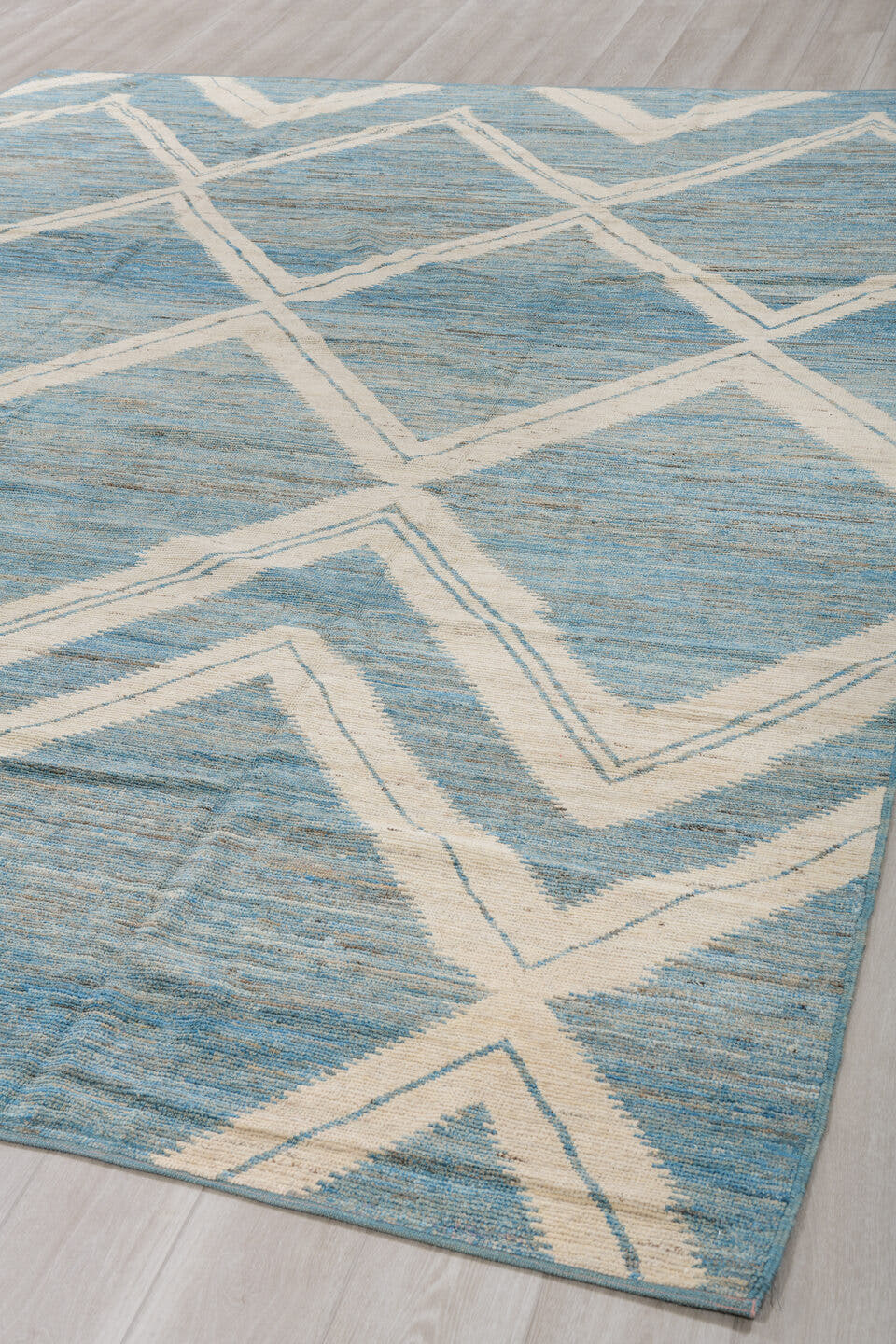 9' x 12' one-of-a-kind handmade vintage Tulu large size rug. Color palette: sky blue, ivory, slate, cream, light blue, gray
