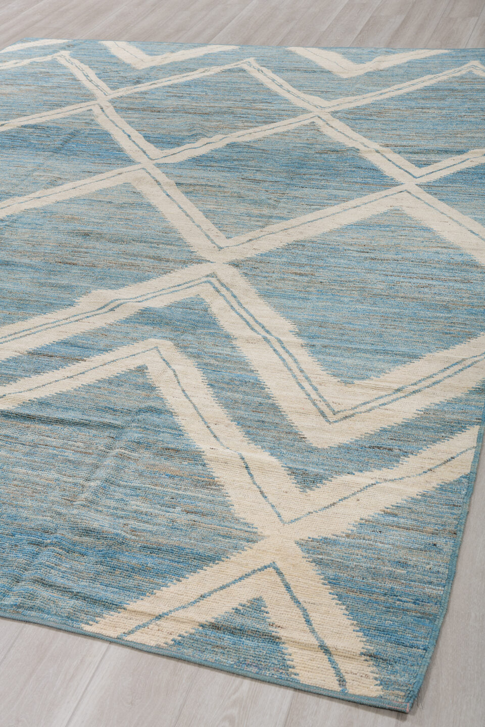 9' x 12' one-of-a-kind handmade vintage Tulu large size rug. Color palette: sky blue, ivory, slate, cream, light blue, gray