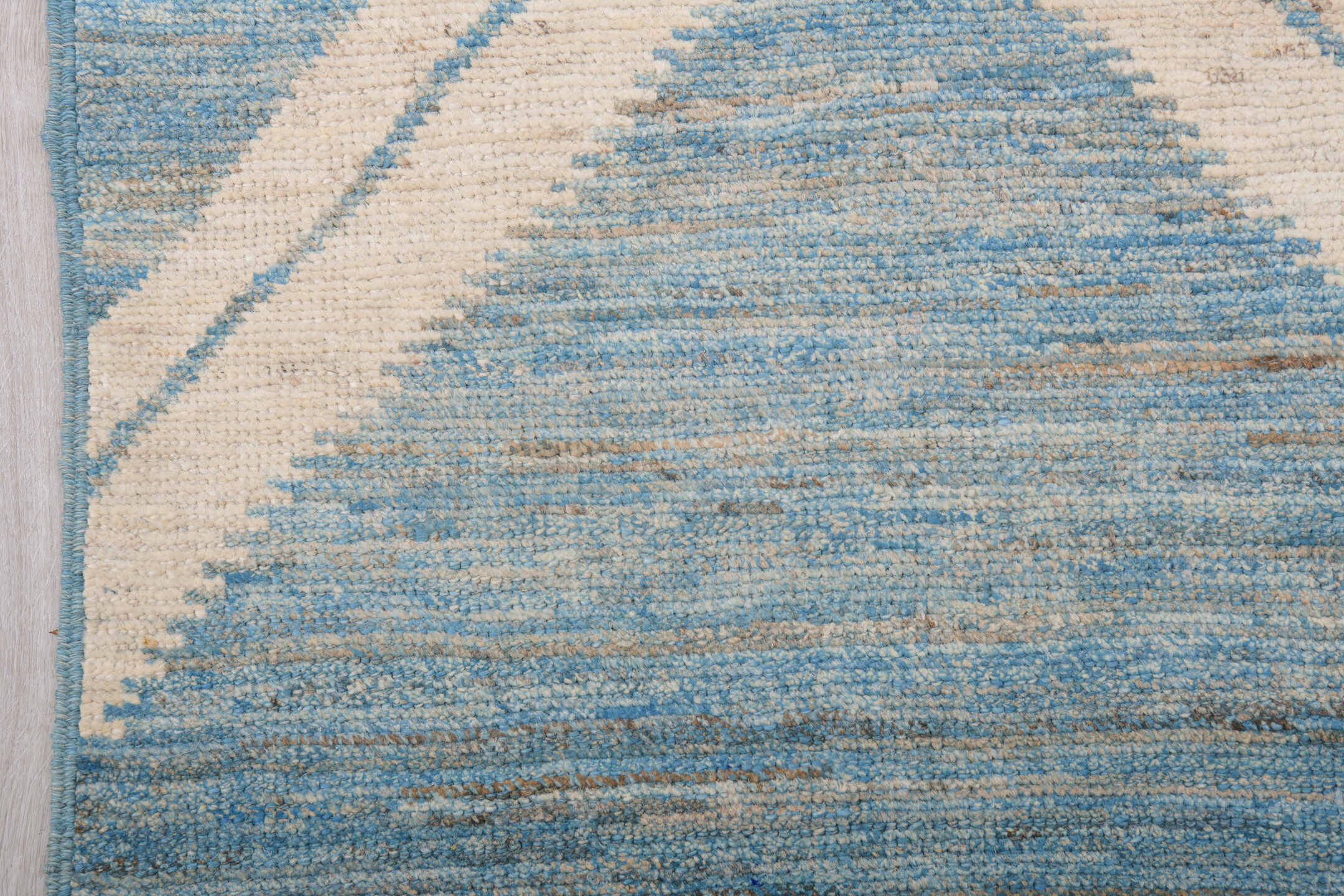 9' x 12' one-of-a-kind handmade vintage Tulu large size rug. Color palette: sky blue, ivory, slate, cream, light blue, gray