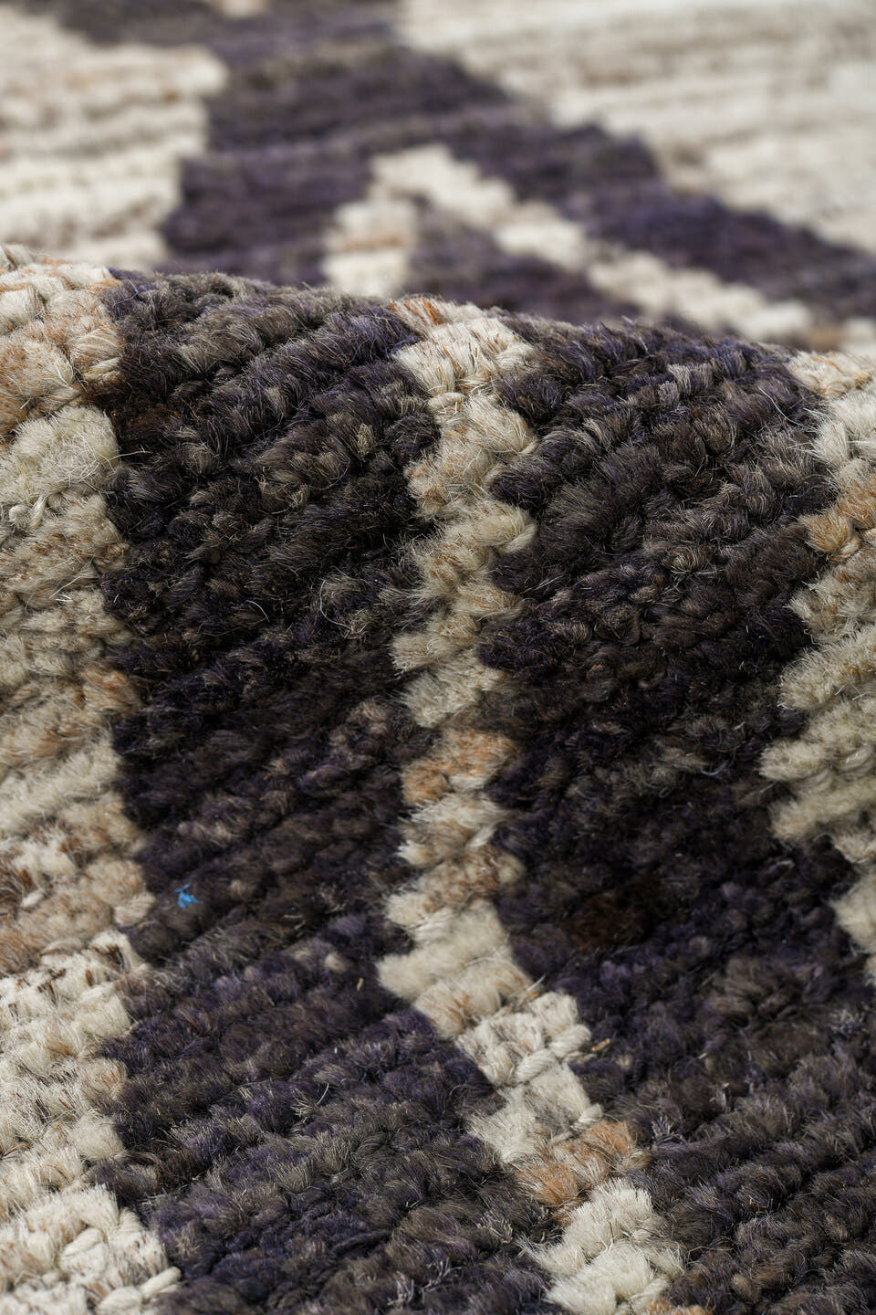 6' x 9' one-of-a-kind handmade vintage Tulu medium size rug. Color palette: ivory, charcoal, taupe, gray, black, beige