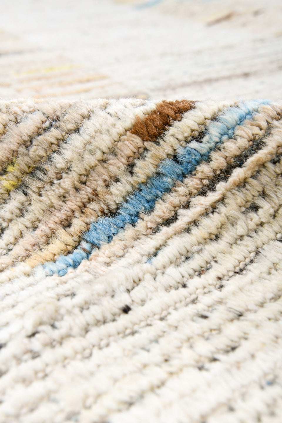 10' x 13' one-of-a-kind handmade vintage Tulu large size rug. Color palette: ivory, charcoal, cobalt, pale yellow, taupe
