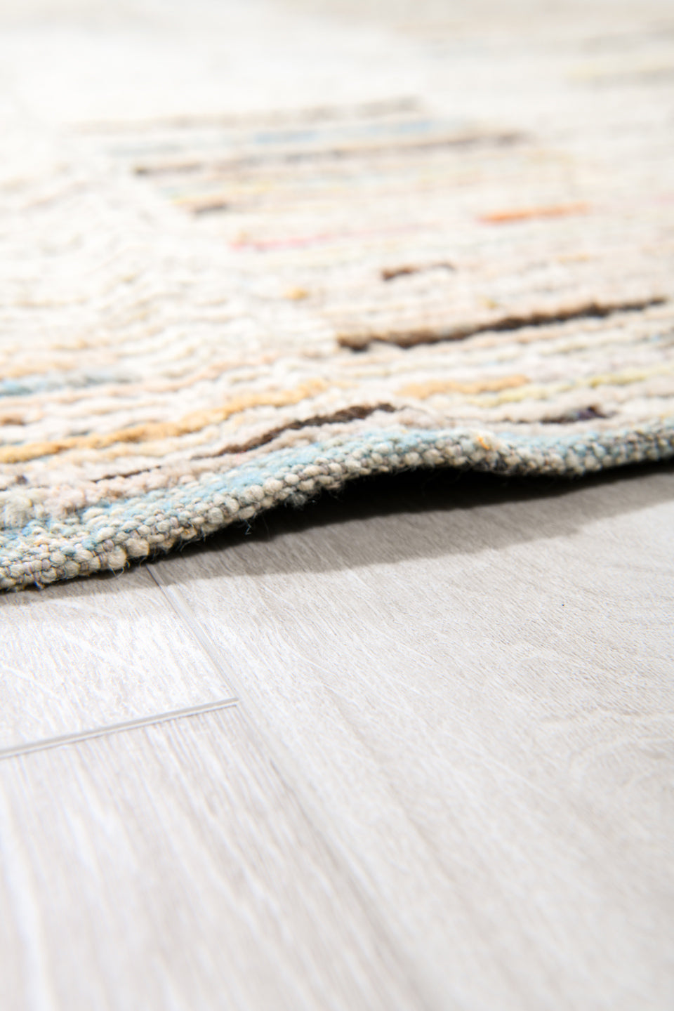 10' x 13' one-of-a-kind handmade vintage Tulu large size rug. Color palette: ivory, charcoal, cobalt, pale yellow, taupe