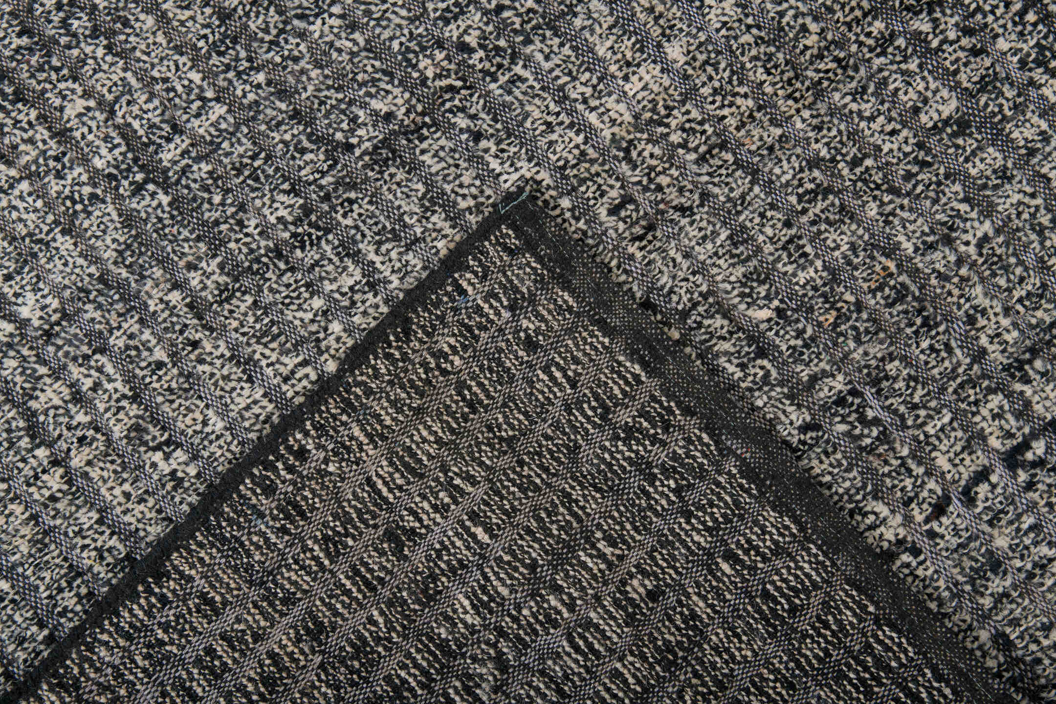9' x 11' one-of-a-kind handmade vintage Tulu large size rug. Color palette: ivory, charcoal, taupe, slate, cream, black