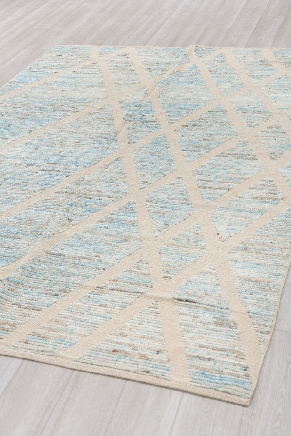 6' x 10' one-of-a-kind handmade vintage Tulu large size rug. Color palette: ivory, pale blue, taupe, gray, cream, light blue