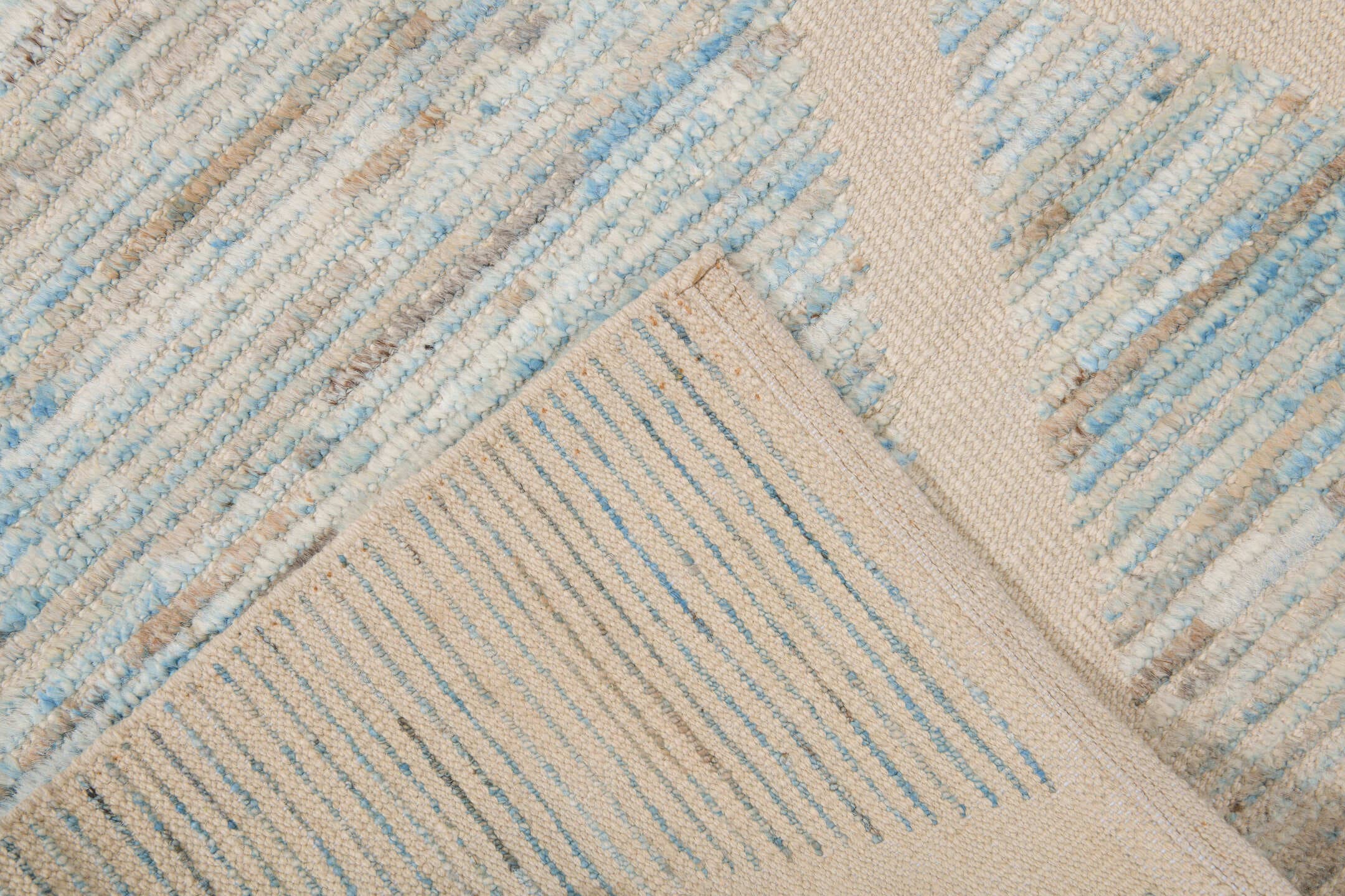 6' x 10' one-of-a-kind handmade vintage Tulu large size rug. Color palette: ivory, pale blue, taupe, gray, cream, light blue
