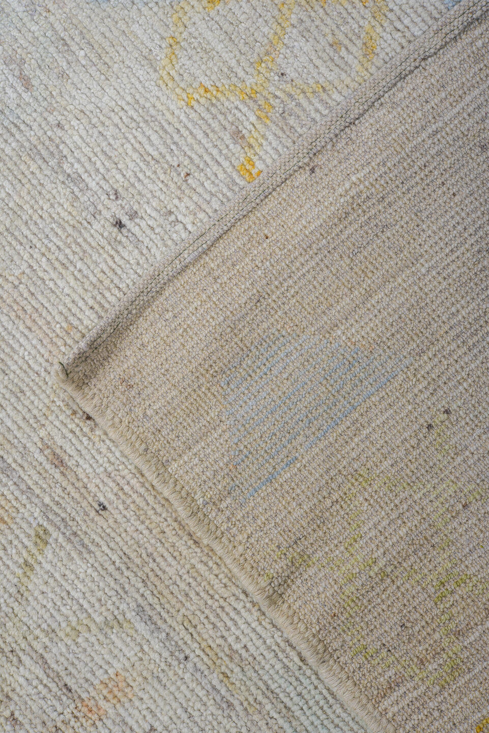 9' x 11' one-of-a-kind handmade vintage Tulu large size rug. Color palette: ivory, pale blue, soft gold, sage, peach, taupe