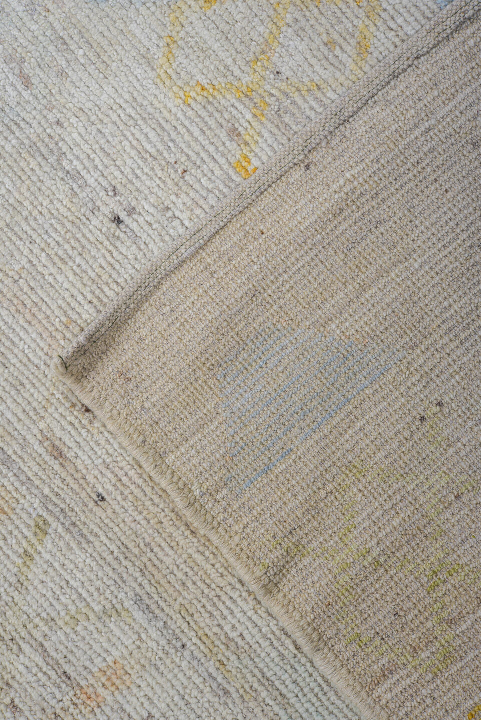 9' x 11' one-of-a-kind handmade vintage Tulu large size rug. Color palette: ivory, pale blue, soft gold, sage, peach, taupe