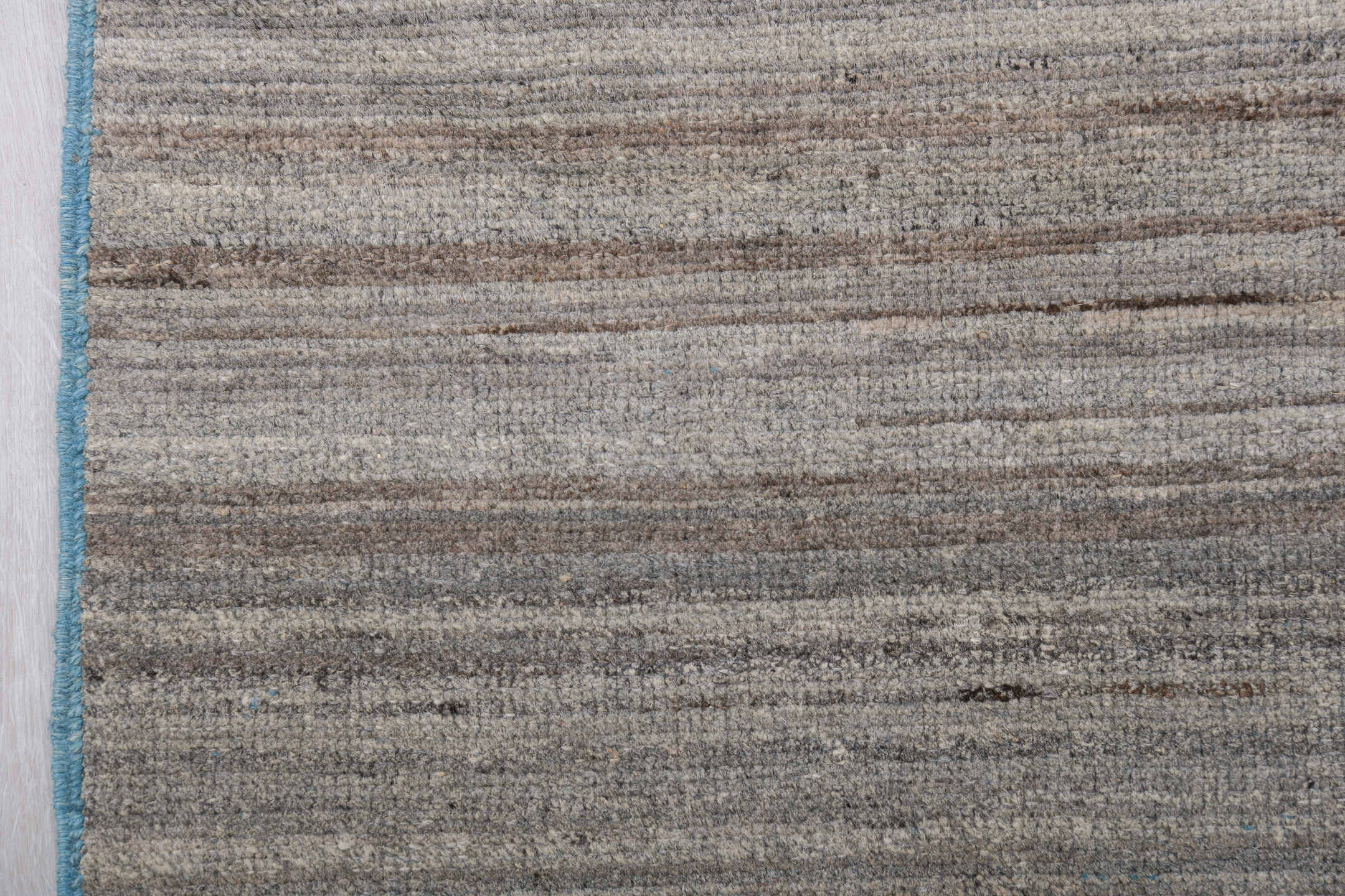 6' x 9' one-of-a-kind handmade vintage Tulu medium size rug. Color palette: taupe, ivory, charcoal, camel, sky_blue, beige