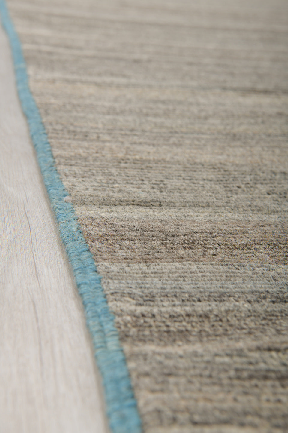6' x 9' one-of-a-kind handmade vintage Tulu medium size rug. Color palette: taupe, ivory, charcoal, camel, sky_blue, beige